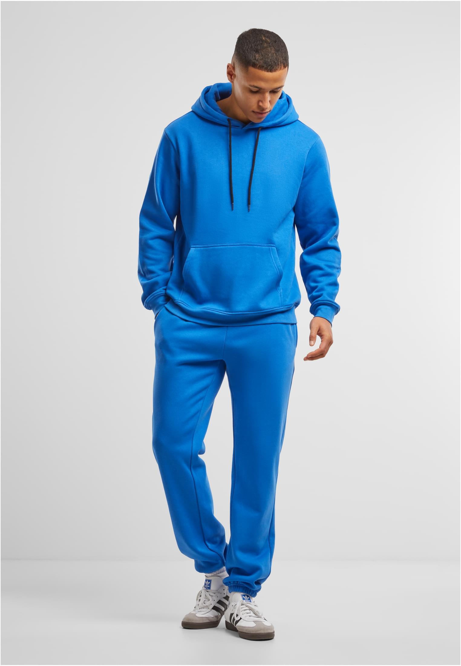 Build Your Brand Basic Joggers – Intense Blue – on model 5