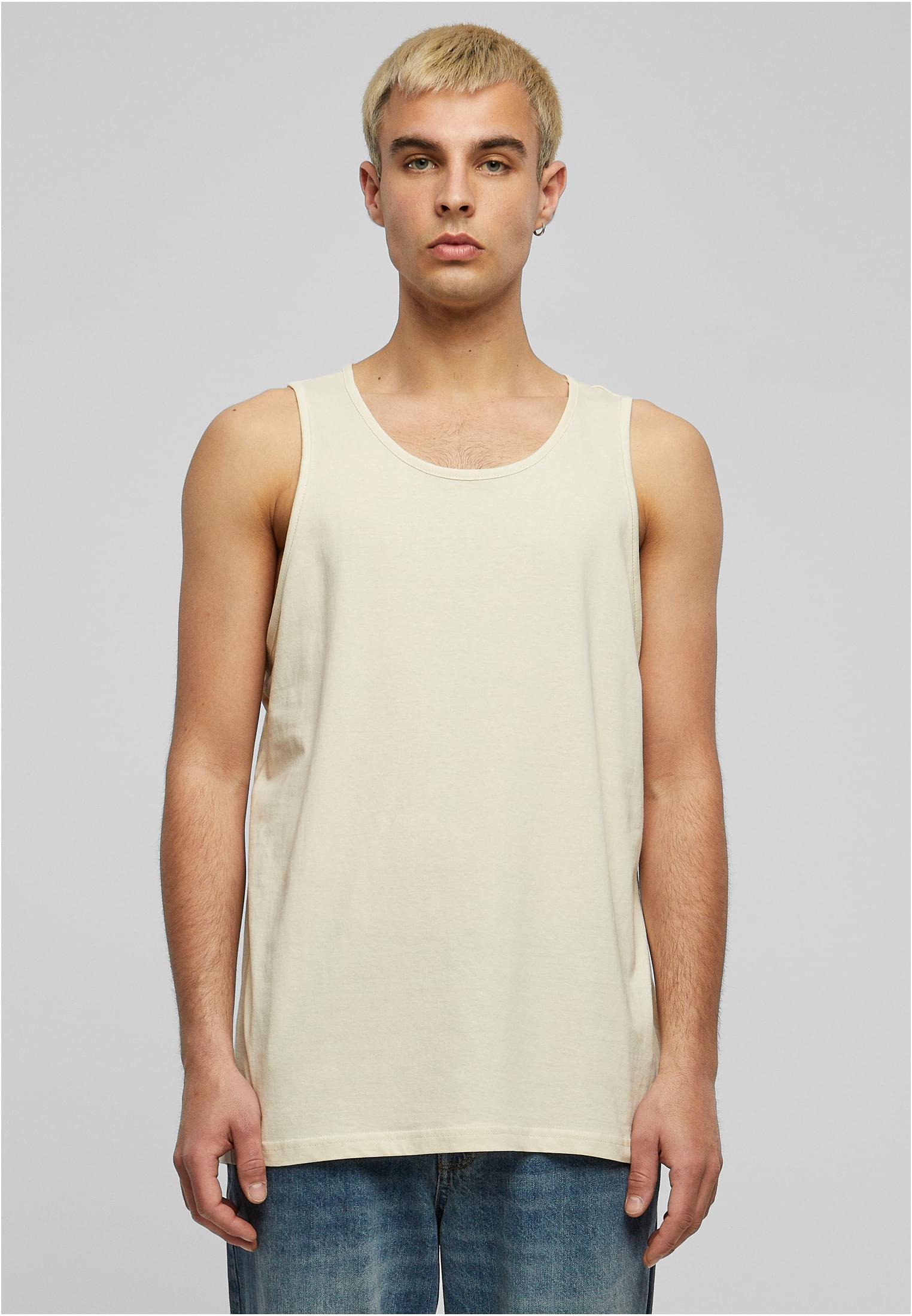 Build Your Brand Basic Vest – Sand – on model 1