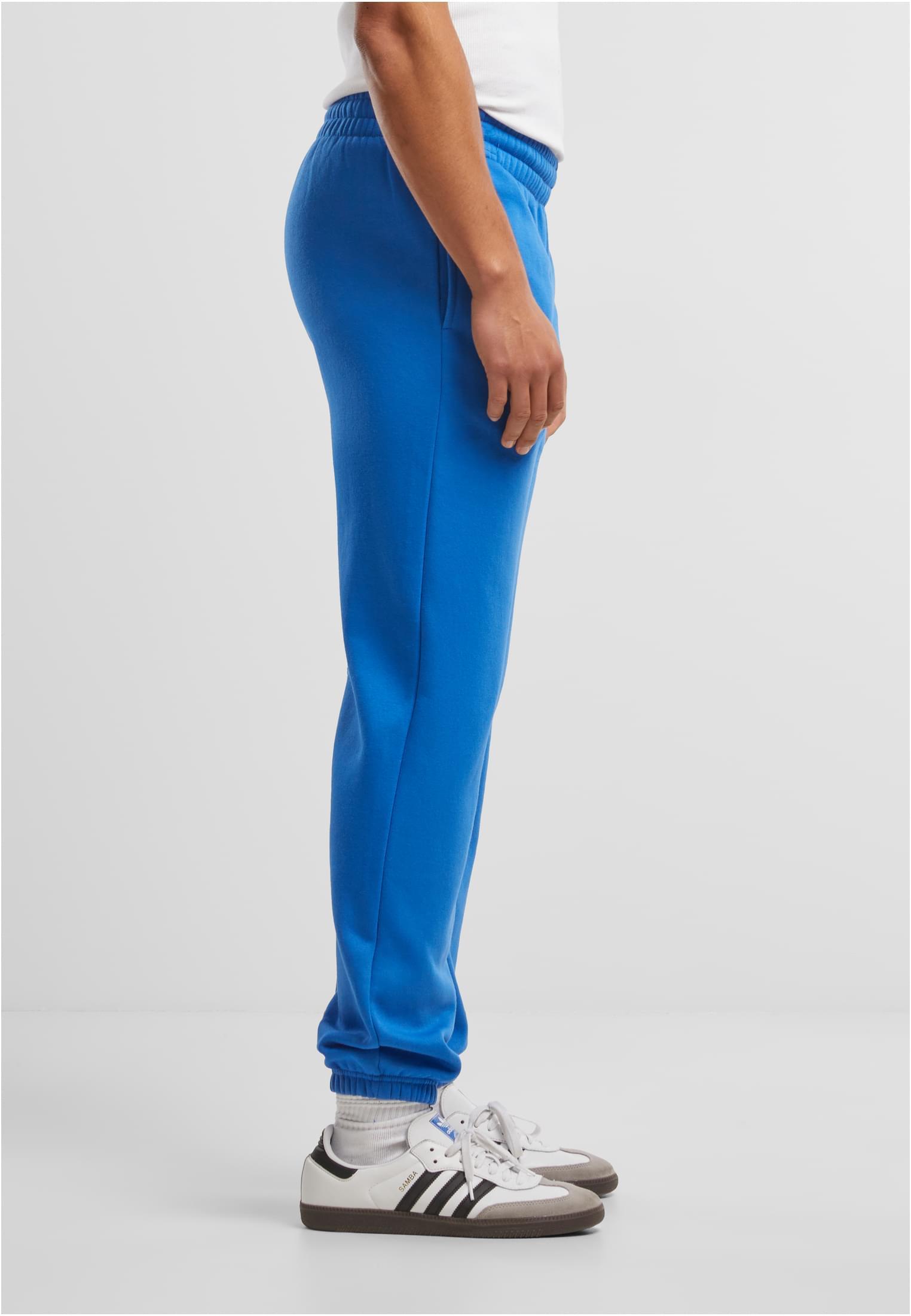 Build Your Brand Basic Joggers – Intense Blue – on model 4