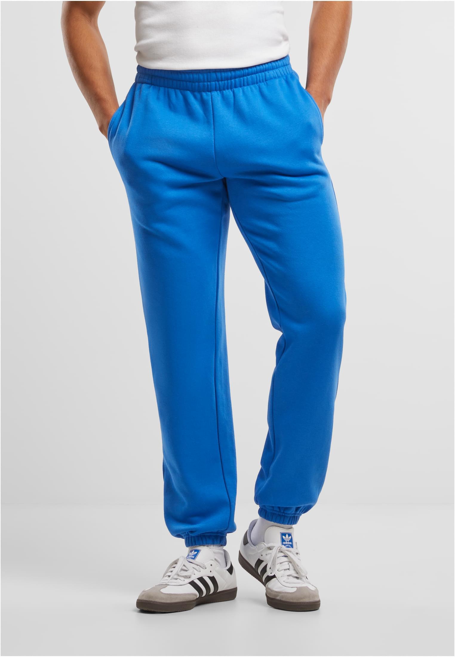 Build Your Brand Basic Joggers – Intense Blue – on model 1